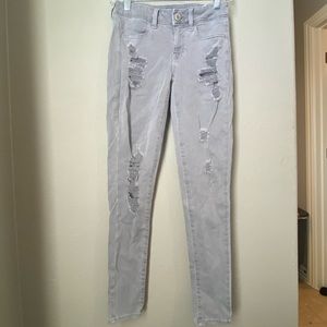 Grey American eagle skinny ripped jeans - size 2